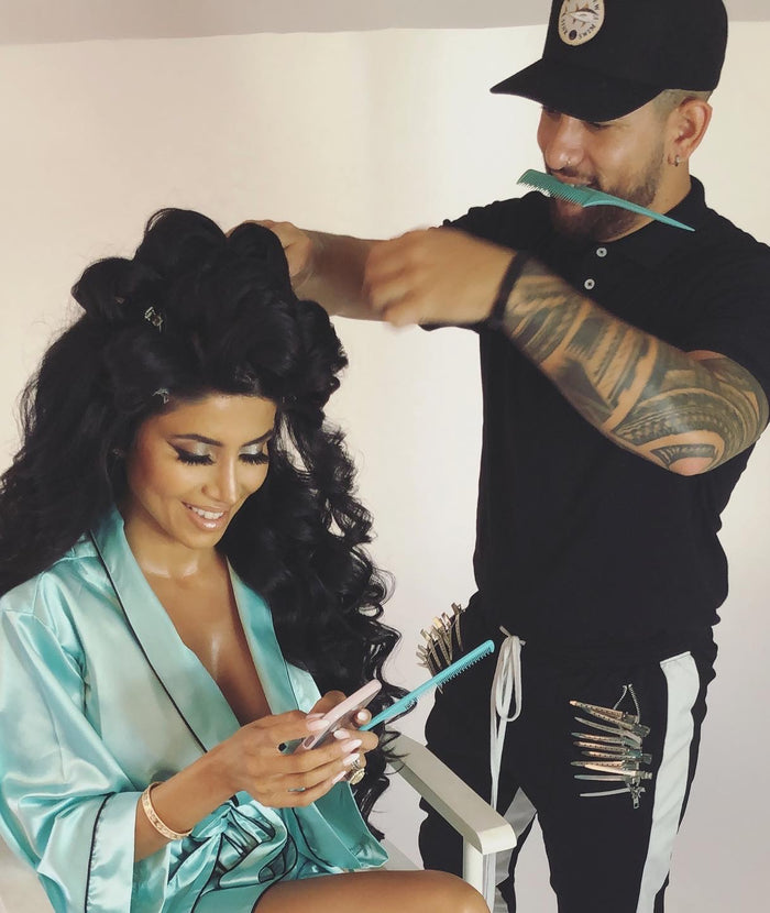 Stylist combing Leyla Milani's hair with a Big Tease Comb